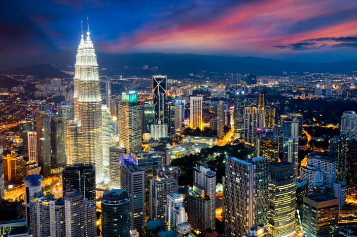 Aerial view of Kuala Lumpur city skyline at dusk